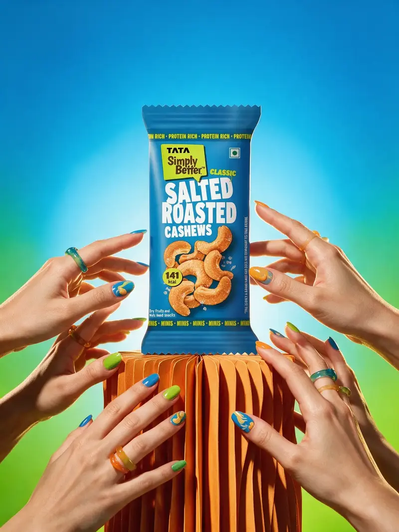 Colourful studio product campaign with hands reaching toward a central packet